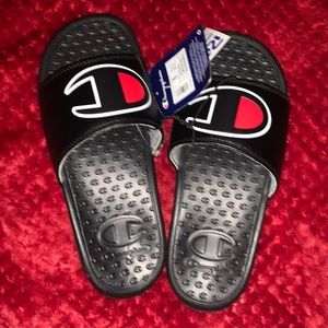 Im selling black champion slides size 5 BRAND NEW NEVER WORN
